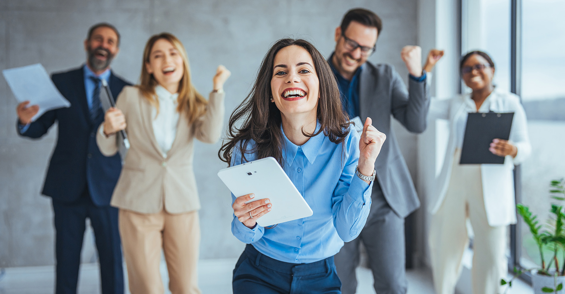 Business people cheering